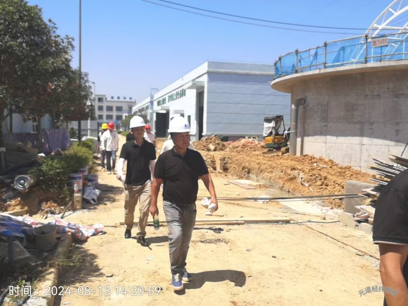 四川铂莱国际环保领导团队高温下考察眉山工业园区污水处理厂项目